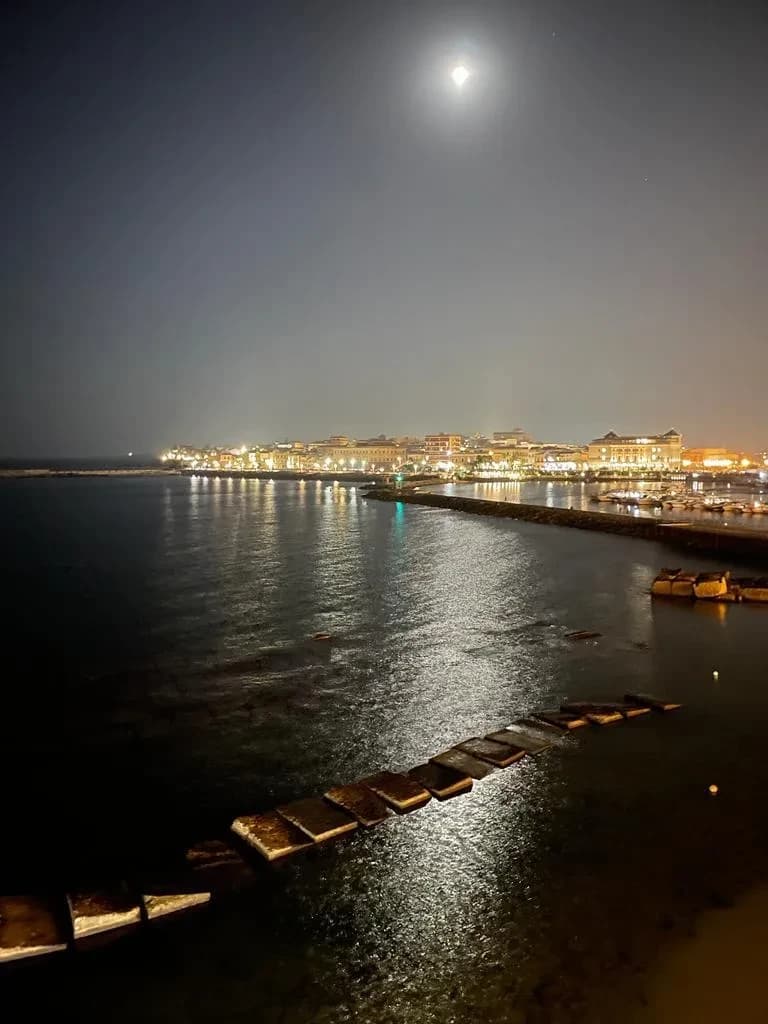 Night view over the sea and harbour