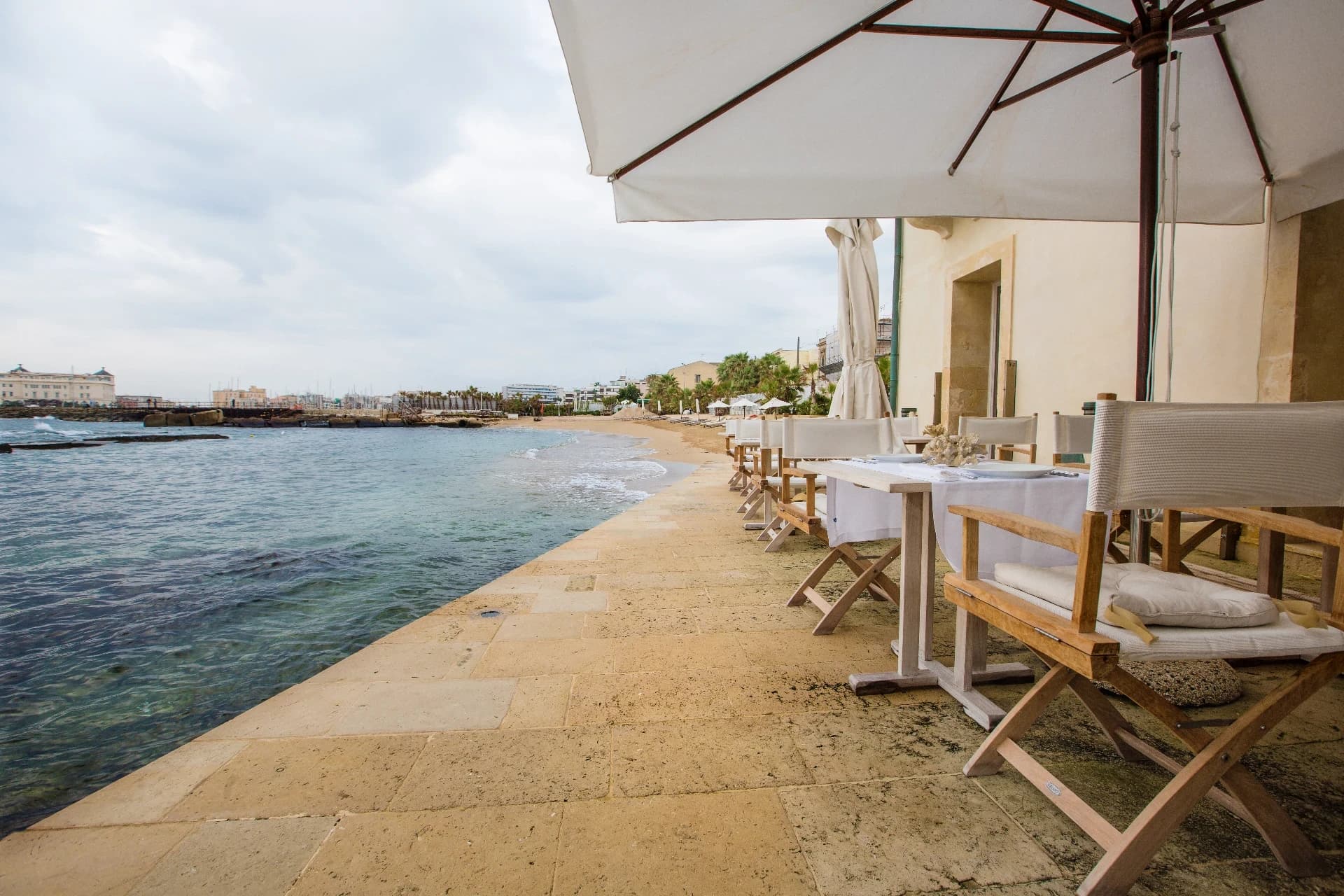 Seafront walkway with umbrella