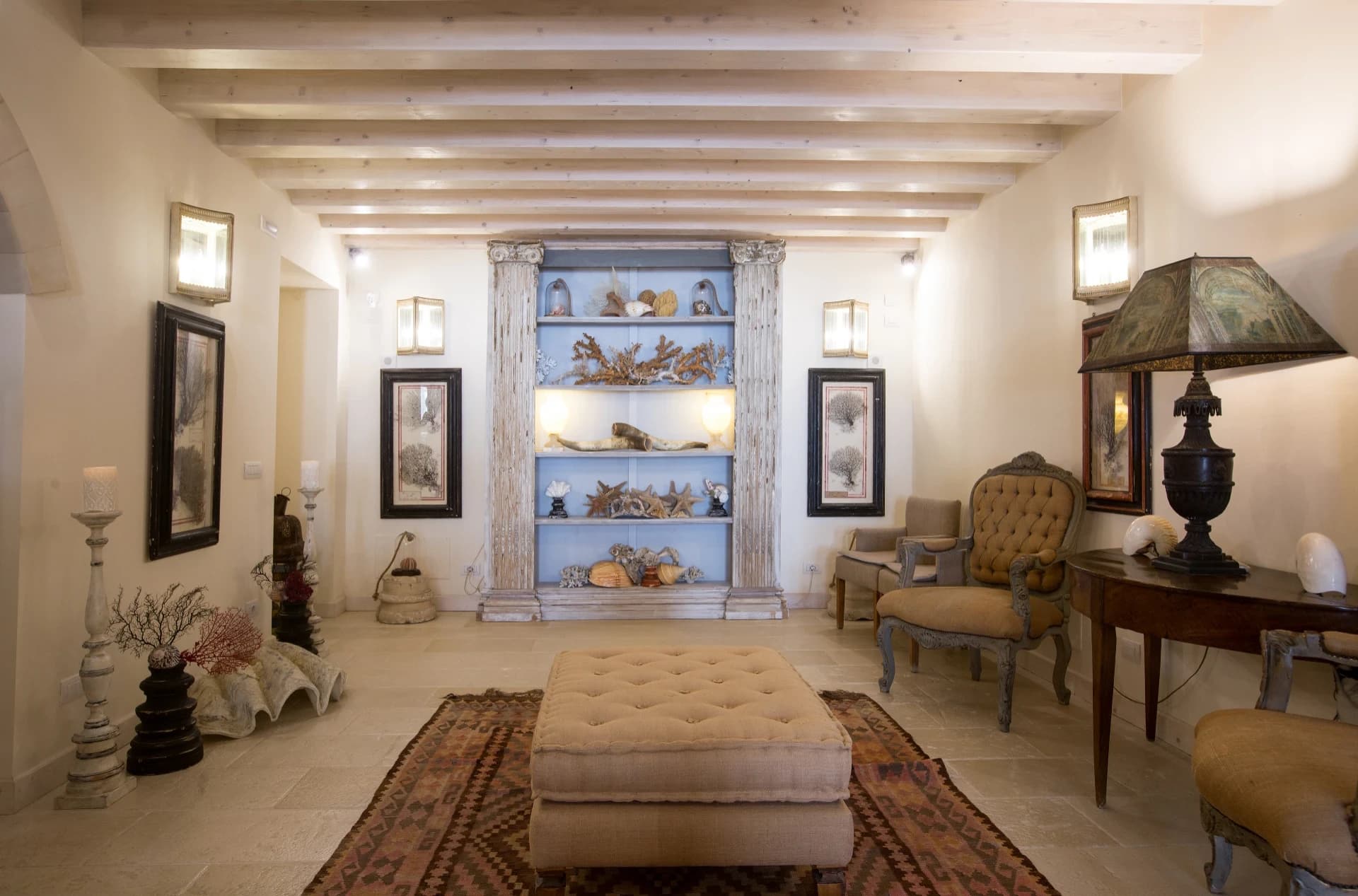 Lounge with bookshelves and lamp