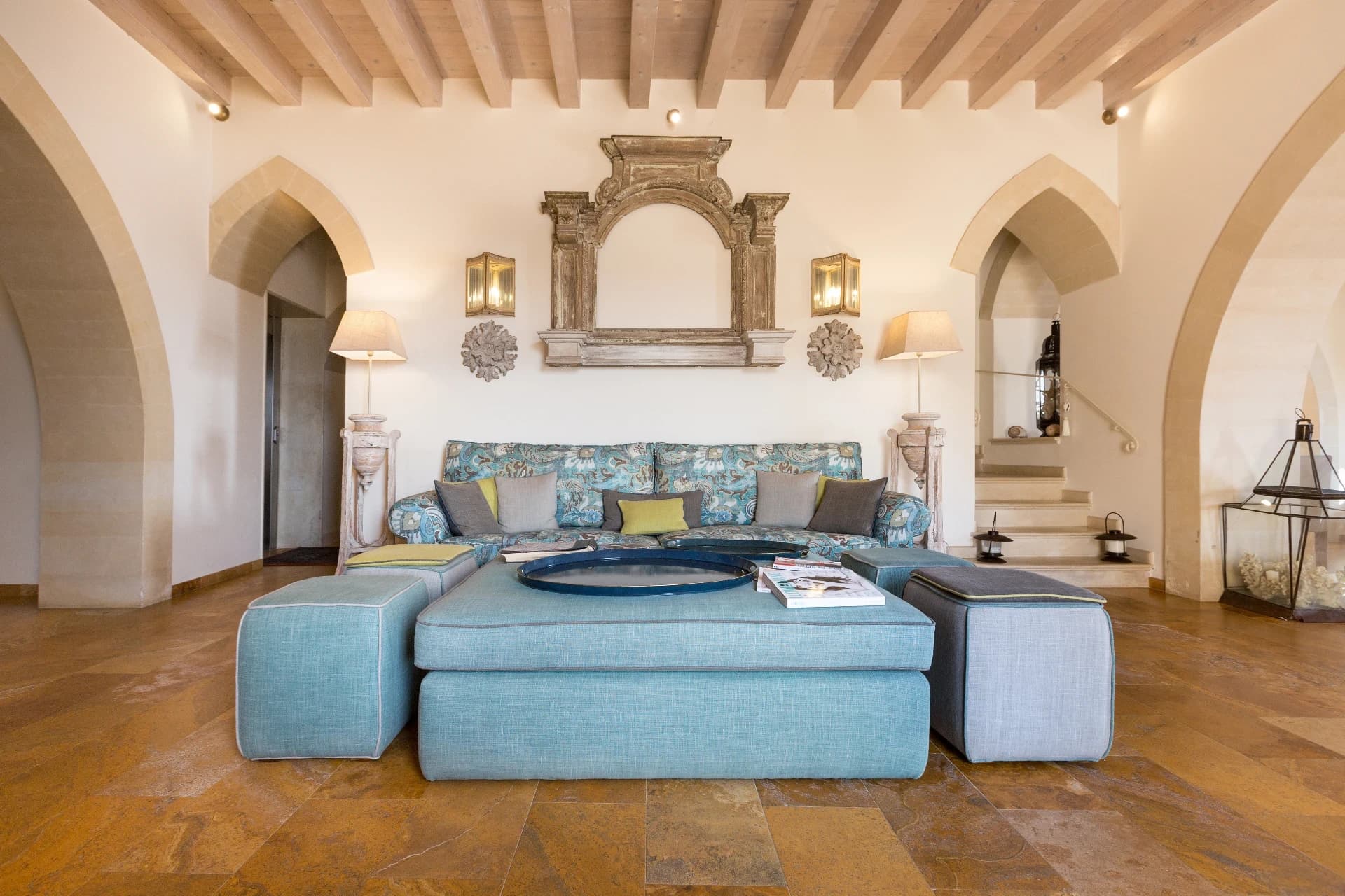 Lounge with arches and blue sofa