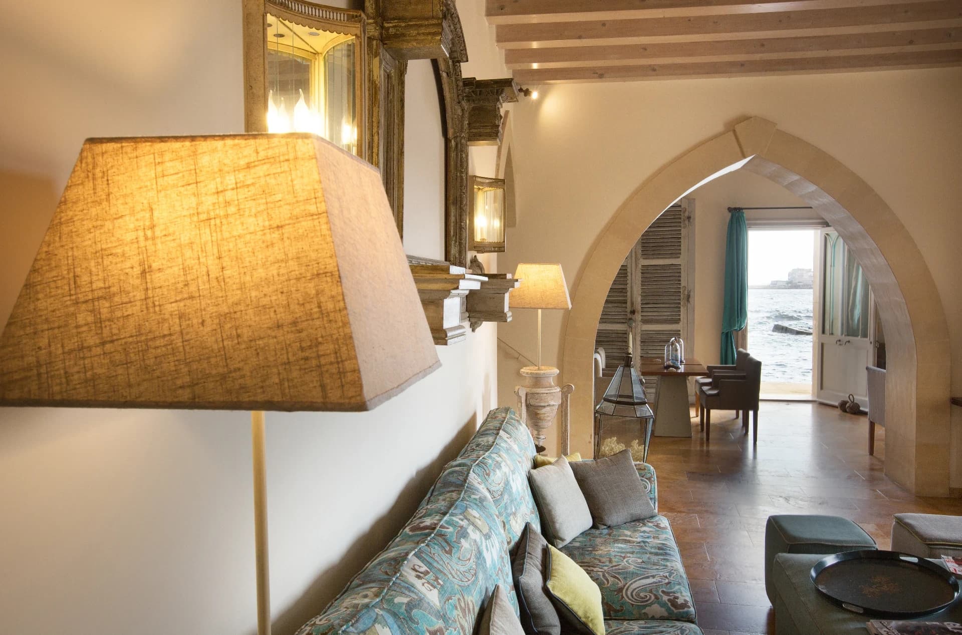 Lounge with arch and sea-view window