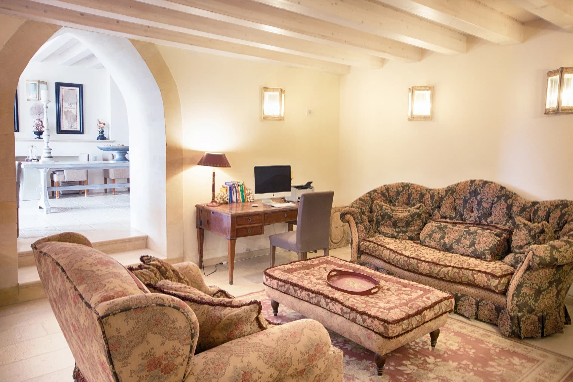 Lounge with floral sofas