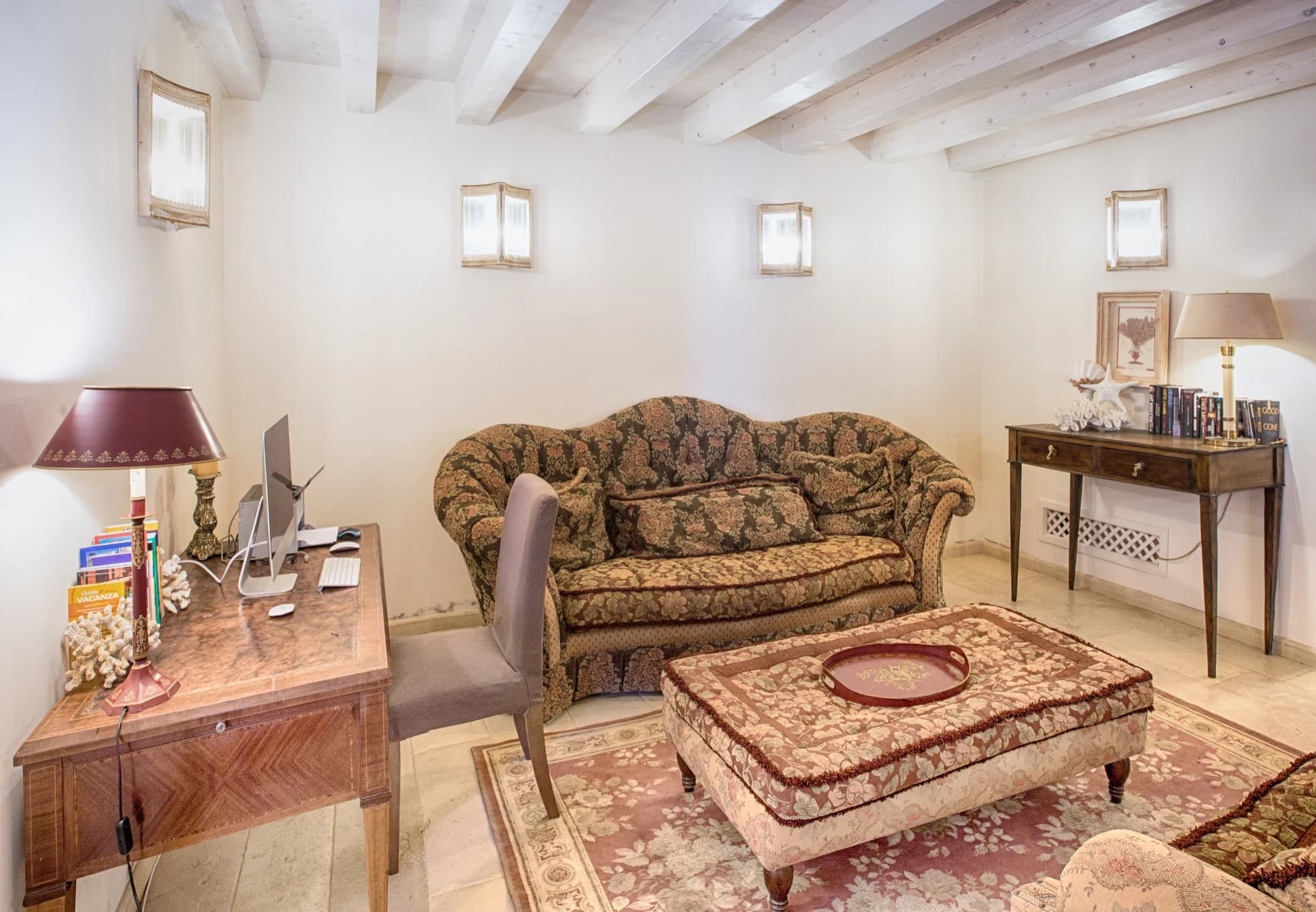 Living room with sofas and writing desk