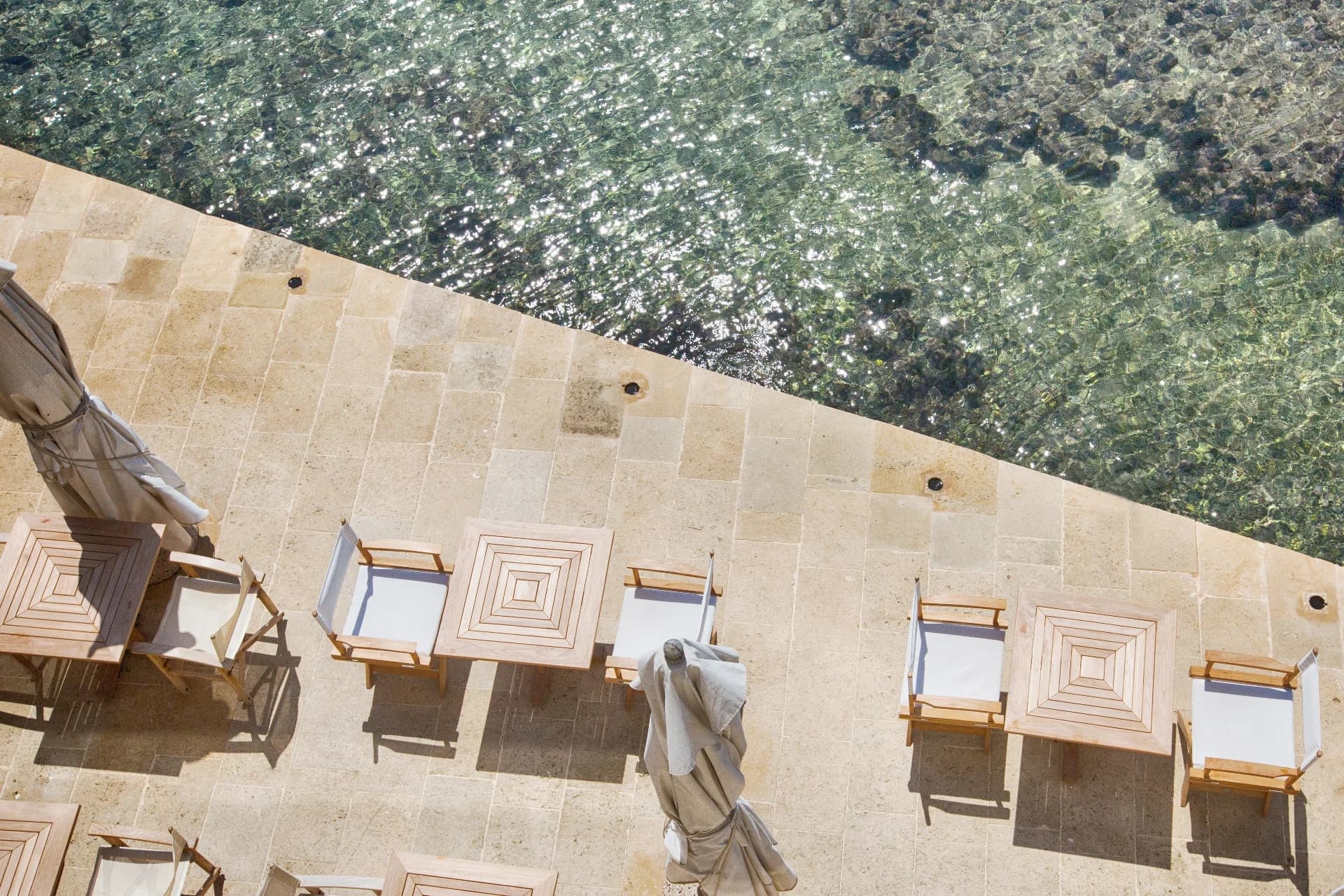 Loungers on the seafront terrace from above