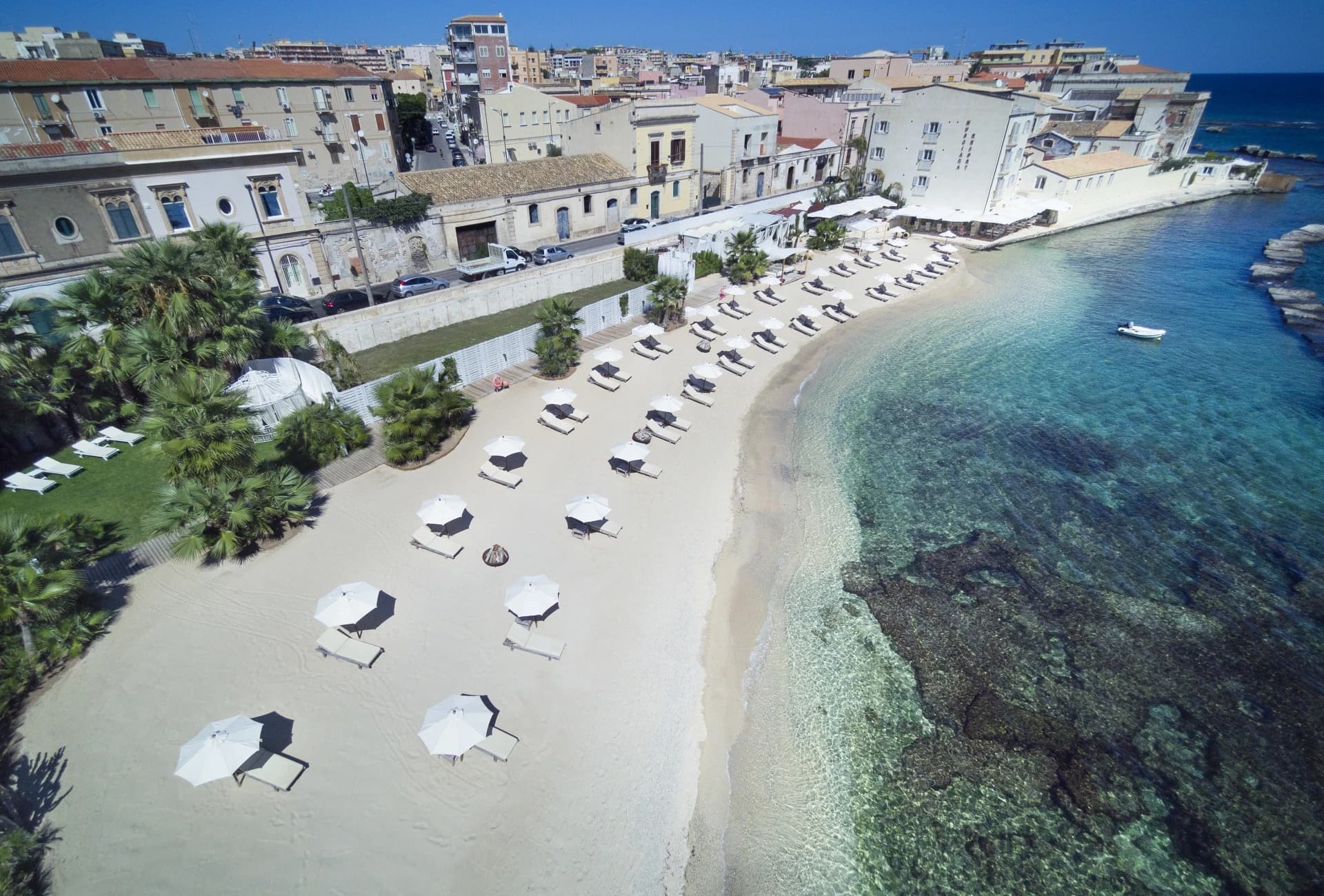 Private beach from above with sunbeds