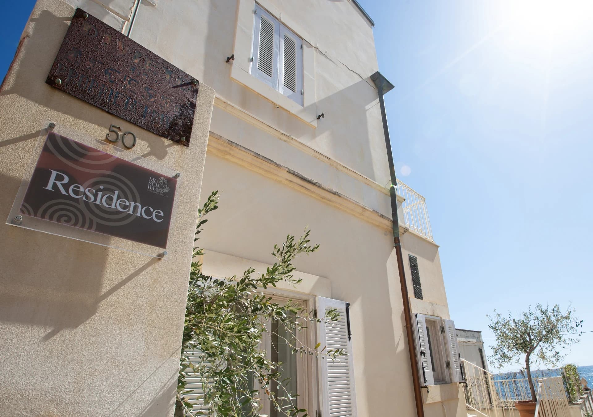 Residence Musciara sign